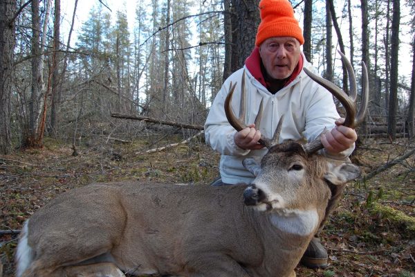 79 year old Lois with his Whitetail Buck