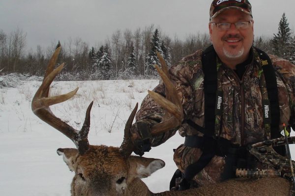 Big old mature 4×4 with bow at Elusive Saskatchewan Whitetail Outfitter