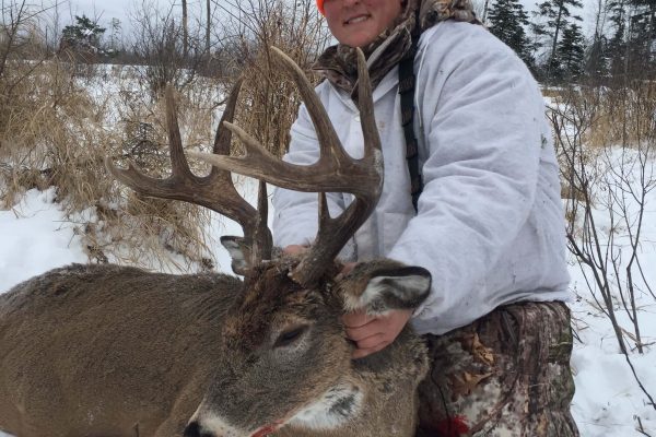 Conner and his heavy antlered Saskatchewan Whitetail Buck