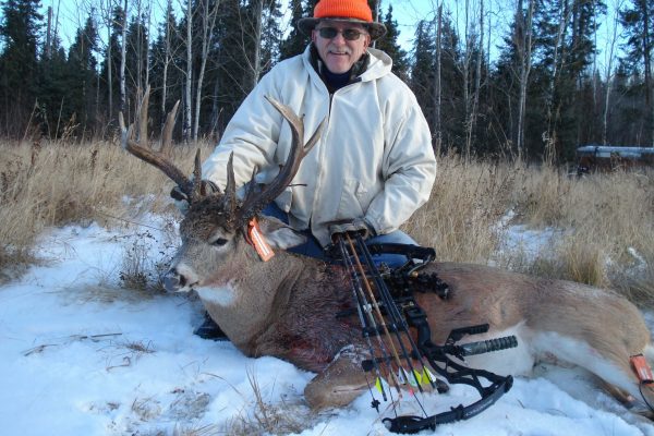 Daniel arrows a nontypical buck at Elusive Saskatchewan Whitetail Outfitters