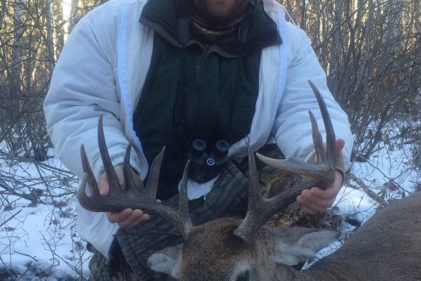 Justin tags a 7×7 at Elusive Saskatchewan Whitetail Outfitters