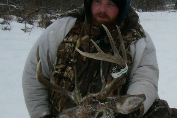 Mathew and his cold weather White Tail Deer Buck at Elusive Saskatchewan Whitetail Outfitter