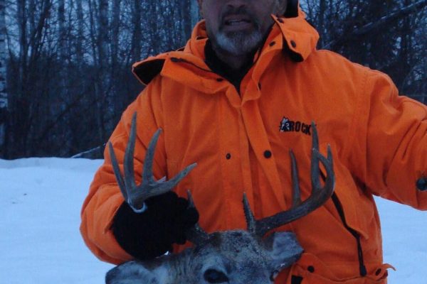 Parrie Sr. with his 10 point White Tail Deer Buck at Elusive Saskatchewan Whitetail Outfitter