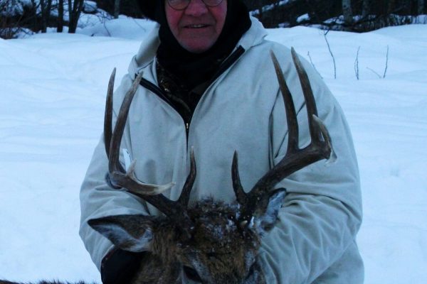 Thomas with his cold weather White Tail Deer Buck at Elusive Saskatchewan Whitetail Outfitter